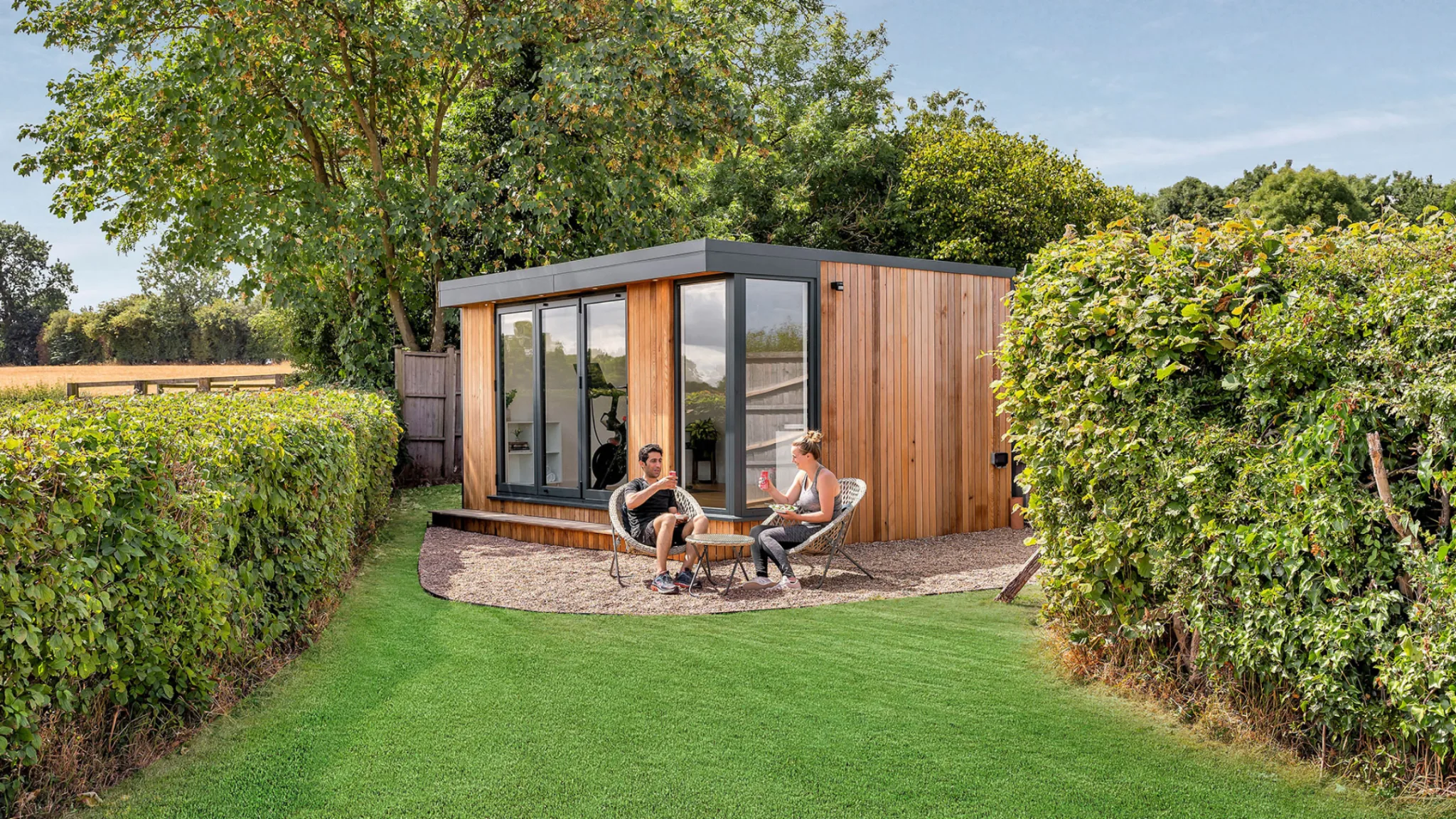 Kingspan garden room exterior integrated with garden landscape